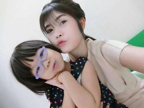 100 Kwang with her student.jpg