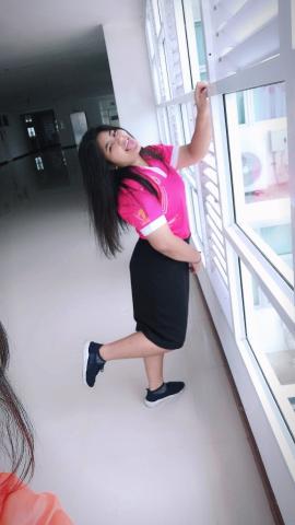 166 Tang Kwa in her bank uniform.jpg